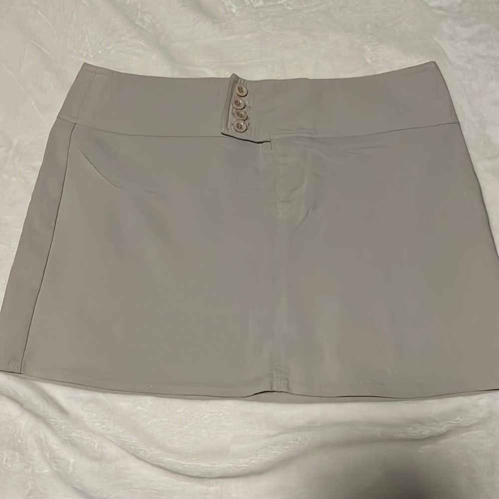Jolt
Color: Tan
Type: Mini skirt
Size: 11